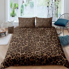 a leopard print comforter set in a bedroom