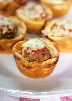 mini meat and cheese quiche cups on a plate