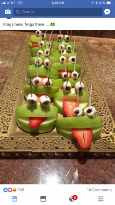 some food is on a tray with strawberries and other items in the shape of eyes