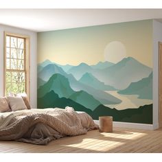 a bedroom with mountains painted on the wall and wooden flooring in front of it