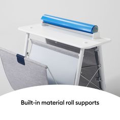 a chair with a blue roller on top of it and the words built - in material roll supports