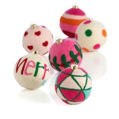 christmas ornaments with the word merry written on them in different colors and sizes, including balls