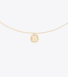 Women's Designer Jewelry | Tory Burch | Tory Burch Elegant Yellow Gold Charm Necklace With Logo, Gold Medallion Necklace With Logo Charm, Gold Necklace With Initial Pendant And Logo Charm, Gold Pendant Necklace With Logo Charm, Yellow Gold Medallion Necklace With Logo Charm, Gold Necklace With Logo Charm And Round Pendant, Gold Plated Pendant Necklace With Logo Charm, Elegant Medallion Necklace With Logo Charm, Yellow Gold Initial Pendant Jewelry With Logo Charm