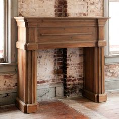 an old brick fireplace in a room