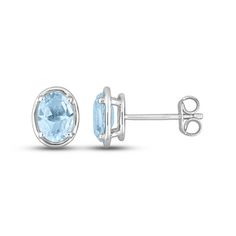 These colorful earrings showcase an entrancing oval-cut blue topaz styled in classic sterling silver. The earrings secure with friction backs. Blue Oval Topaz Earrings, Oval Birthstone Earrings In White Gold, Oval White Gold Earrings With Birthstone, Blue Topaz Oval Earrings, Classic Light Blue Oval Jewelry, Classic Oval Blue Topaz Jewelry, Oval Stud Earrings, Kay Jewelers, Silver Prices