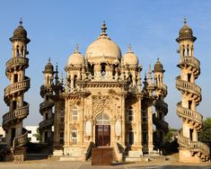 an ornate building with many spires in front of it