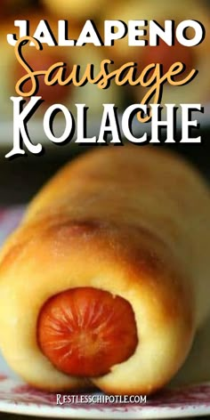 a sausage roll on a plate with the words jalapeno sausage kolache