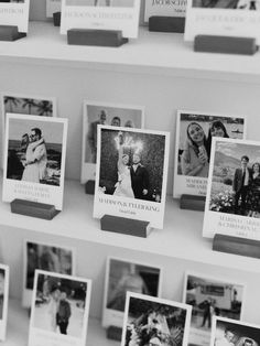 black and white photograph of wedding photos on display