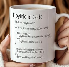 a woman holding a coffee mug with the words boyfriend code printed on it