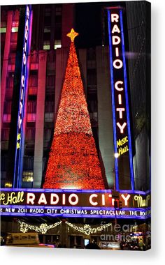 radio city christmas tree in front of radio city music hall