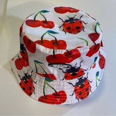 Petals & Peacocks Ladybug And Cherries Bucket Hat, Satin Fabric O/S, Nwt Sweet Red Poppy Bucket Hat, Vintage Red Bucket Hat, Peacock Accessories, Satin Fabric, Bucket Hat, Red And White, Satin, Women Accessories, Hats