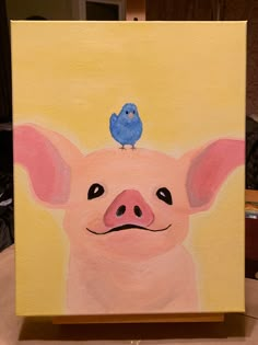 a painting of a pig with a blue bird on it's head