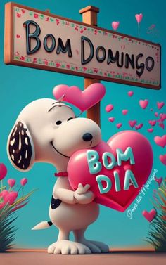 a cartoon dog holding a heart in front of a sign that says bom dia