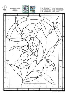 a stained glass window with flowers on it