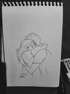 a drawing of a couple hugging each other