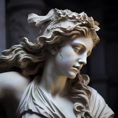 a close up of a statue of a woman with her hair blowing in the wind