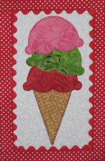 an ice cream cone with pink and green toppings on red polka doted background