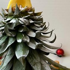 a large pineapple sitting on top of a table