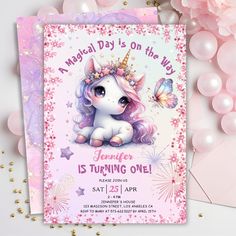 a pink unicorn birthday party with balloons and confetti