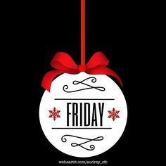 a white ornament with a red bow and the words friday hanging from it