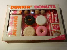 an open dunkin donuts box with doughnuts in it