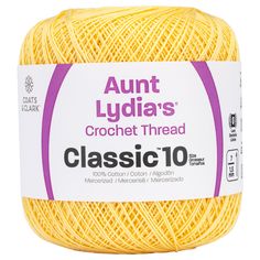 a ball of yellow yarn with the words classic 10 in front of it and an image of