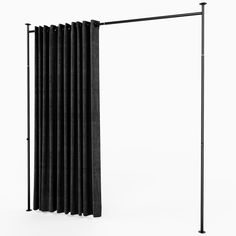 a black curtain is hanging on a pole