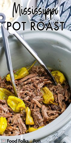 a pot roast with peppers and meat is being cooked in the slow cooker for dinner