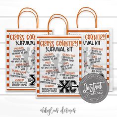 two orange and white striped bags with the words cross country survival kit on each bag