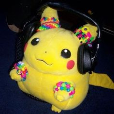 a yellow stuffed animal with headphones on