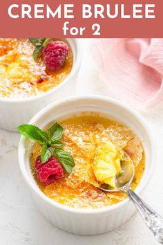 two bowls of creme brulee with raspberries on top