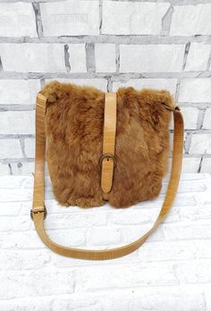 "rabbit fur  bag saddle bag shoulder bag womens bag crossbody handbag crossbody bag  Everyday bag Boho Bag womens Handbag Please refer to photos for details of condition. The bag is in nice vintage condition. The lining is clean and unmarked. Please refer to photos for details of condition.  Size 11\" (27 cm) * 10\" (25 cm) Made of  Leather We appreciate your patience. Thank you so much for looking at my works! Please do not hesitate to contact with me for any questions. See you." Brown Winter Crossbody Shoulder Bag, Brown Crossbody Shoulder Bag For Winter, Faux Fur Shoulder Bag For Everyday Use, Rectangular Faux Fur Shoulder Bag With Fur Lining, Faux Fur Shoulder Bag For Daily Use, Rectangular Faux Fur Shoulder Bag, Winter Brown Faux Fur Shoulder Bag, Faux Fur Tote Shoulder Bag, Brown Shoulder Bag With Faux Fur Lining For Winter