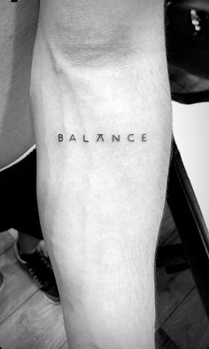 BALANCE Balance Tatoos Ideas, Tattoo Ideas Balance, Balance Tattoo Men, Life Balance Tattoo, Queen Inspired Tattoos, Consistency Tattoo Ideas, Small Tattoo Man, Small Word Tattoos Men, Small Tattoos For Guys With Meaning