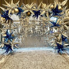 an elaborately decorated stage with blue and gold decorations