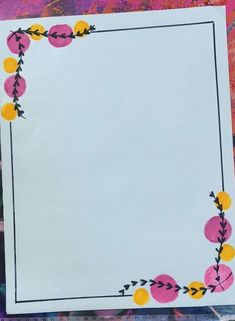 a piece of paper with flowers and leaves on it