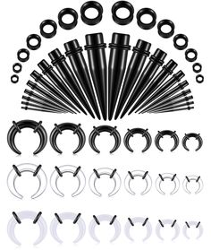 an assortment of different types of black metal fittings and rings on a white background