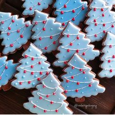 decorated cookies in the shape of christmas trees