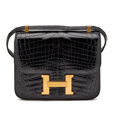 Black Shiny Niloticus Crocodile Constance 24 Gold Hardware, 2012 | Handbags & Accessories | Luxury Collectibles | Sotheby's Accessories Luxury, Hermes Bags, Fashion Handbags, Handbag Accessories, Gold Hardware, Luxury Bags, Dust Bag, Shoulder Strap, Collectibles