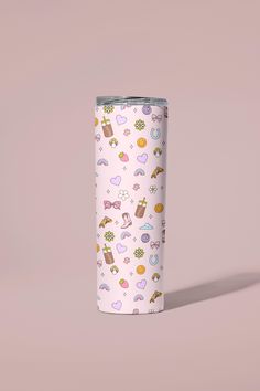 the tumbler cup has many different things on it and is white with pink background