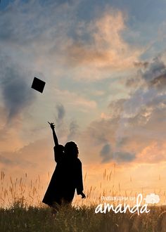 a person is flying a kite in the sky at sunset or dawn with an amazing background