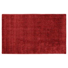 a red area rug with horizontal stripes on the bottom, and vertical lines on the top