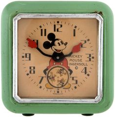 an alarm clock with mickey mouse on it