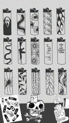 a bunch of different types of lighters on a table with some stickers around them