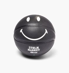 a basketball with a smiley face painted on it