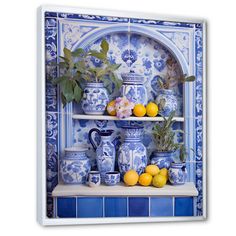 a blue and white shelf with vases, lemons and flowers