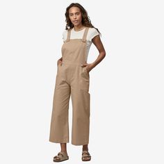 Overalls meet our beloved Stand Up® Shorts in a cropped silhouette. Comfortable, versatile and made for getting dirty in the garden, they are constructed of our classic organic cotton Stand Up canvas with a touch of stretch. Made in a Fair Trade Certified™ factory. | Patagonia Women's Stand Up® Cropped Overalls in Oar Tan, Size 10 - Outdoor Clothing - Organic Cotton/Spandex Cotton Overalls, Utility Jumpsuit, Woman Standing, Overalls Women, Fabric Details, Patagonia Womens, Outdoor Outfit, In The Garden, Fair Trade