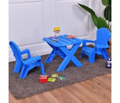 two children's plastic chairs and a table on the floor