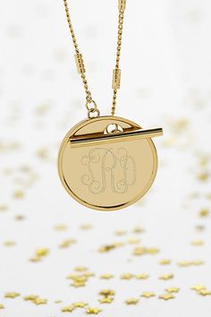 Please note that all sales are final. The Brook & York Custom Monogram Toggle Necklace offers a hint of shimmer and can be worn on its own or with any other necklace for a layer effect. This monogram necklace is the perfect custom gift for a bridesmaids, birthday for her, anniversary or a gift for yourself. Important Customization Information: A brook & york representative will reach out via email to confirm desired customization after purchase. Production time of your piece does not start until after your customization has been received. Your order will be cancelled if your customization is not confirmed within 1 week from purchase. brook & york- As an American-inspired, American-made company it is important to us that all of our jewelry is made here in the USA with supreme care and lovin Yellow Gold Round Pendant Toggle Necklace, Yellow Gold Toggle Necklace With Round Pendant For Gift, Gold Necklace With Toggle Clasp For Anniversary, Yellow Gold Medallion Toggle Necklace Gift, Modern Necklaces With Toggle Clasp For Gift, Modern Necklace With Toggle Clasp For Gift, Classic Toggle Necklace With Adjustable Chain As Gift, Toggle Necklace With Pendant As Gift, Adjustable Yellow Gold Toggle Necklace Gift