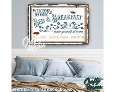 a bed room with a neatly made bed and a framed sign above it that says welcome to our bed and breakfast