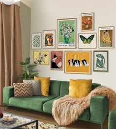 a living room filled with furniture and lots of pictures on the wall above it's green couch